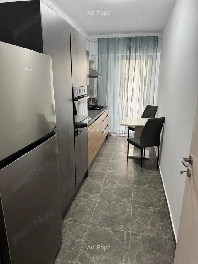 Garsoniera de inchiriat-Titan-1 Decembrie-cu centrala-loc de parcare - 4