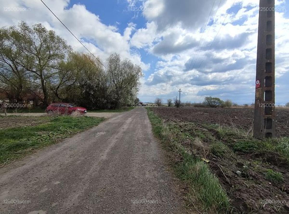 Teren intravilan 4,57 ha în Stupini - DN13. - 5
