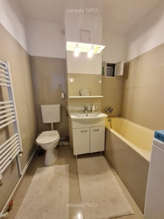 Apartament cu 3 camere semidecomandat, mobilat în Central - 13