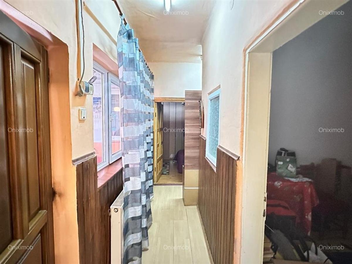 Casa batraneasca, zona  Buna Vestire  Ploiesti, teren 175 mp,renovata in 2004 - 9