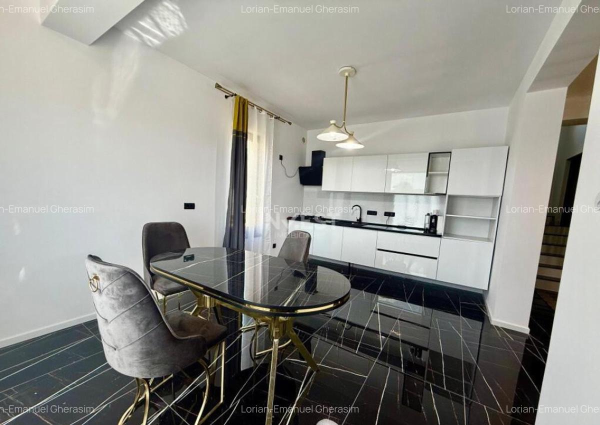 Vila de vanzare cu design deosebit in cartierul Bucium - 6