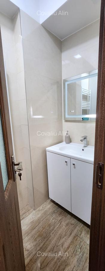 Apartament 2 camere, 2 grupuri sanitare, loc parcare, situat in Tractorul - 13
