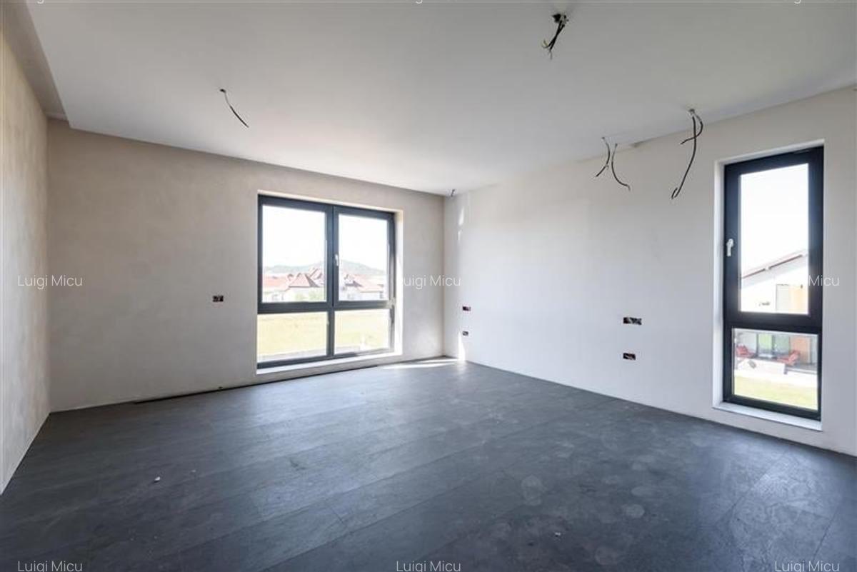 Casa noua in Harman, cu arhitectura moderna si spatii vitrate - 7