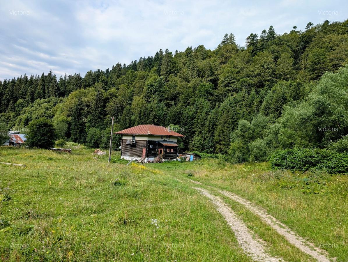 Predeal,P+1,casa din busteni,in spatele terenului-raul Prahova,posibil extindere - 22