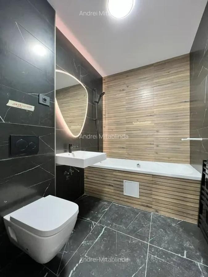 Apartament cu 5 camere decomandat în Titan - 12