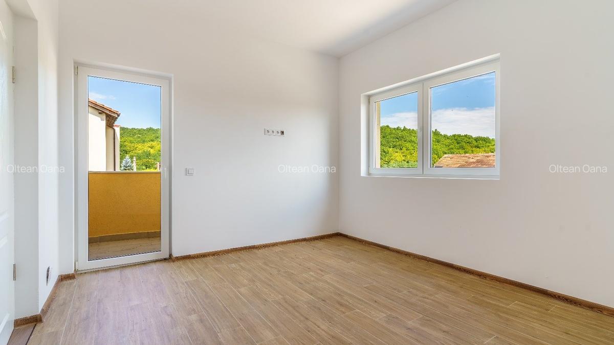 Casa finisata de vanzare in Gilau, 5 camere+ mansarda, teren 810mp - 9