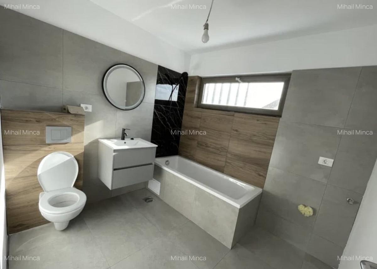 APARTAMENT CU GRĂDINĂ & LOC DE PARCARE –  54 mp - 4