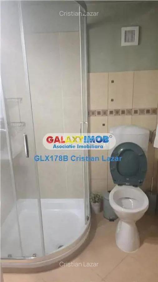 CASA IN CURTE COMUNA - 12
