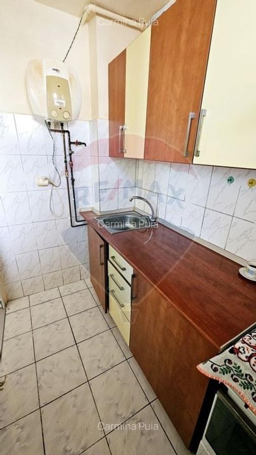 Garsoniera str Traian 48 - DE VANZARE- zona Calea Bucuresti - 12