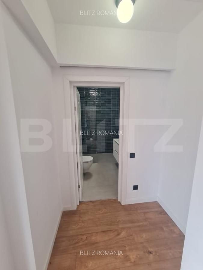 Apartament finisat, 52 mp utili, terasa 34 mp, bucatarie inchisa, garaj - 7 Apartament finisat, 52 mp utili, terasa 34 mp, bucatarie inchisa, garaj - 7