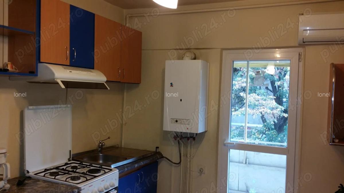 Apartament de inchiriat, peste strada de CN Spiru Haret - 4