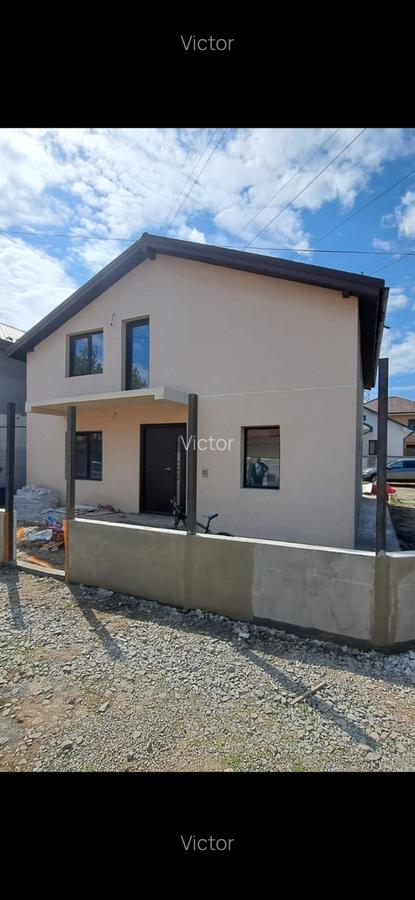Navodari- casa p+m 4 dormitoare , living , 2 gr sanitare - 7