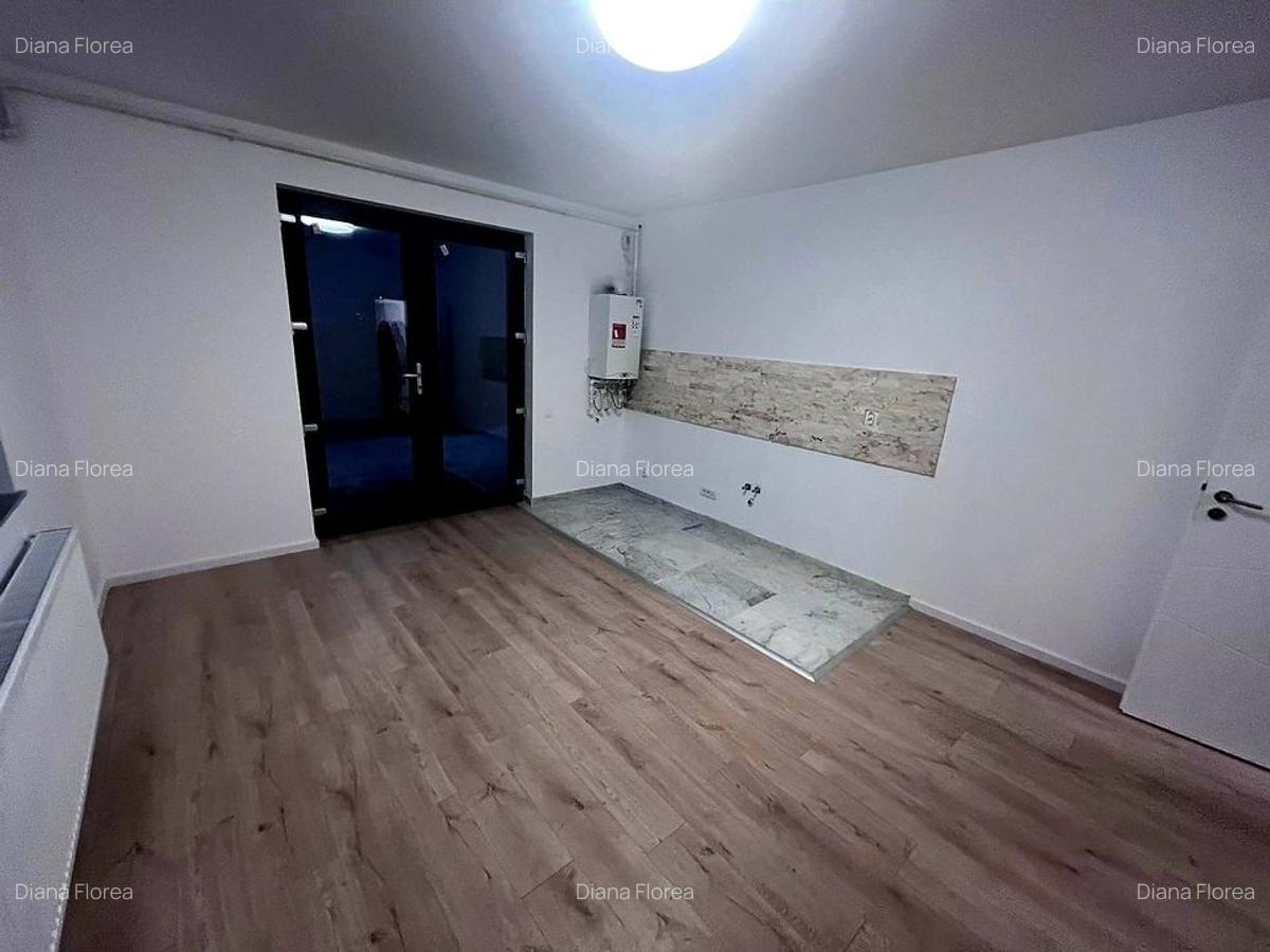 BUFTEA - APARTAMENT 3 CAMERE CU TRERASA SI CURTE. - 3