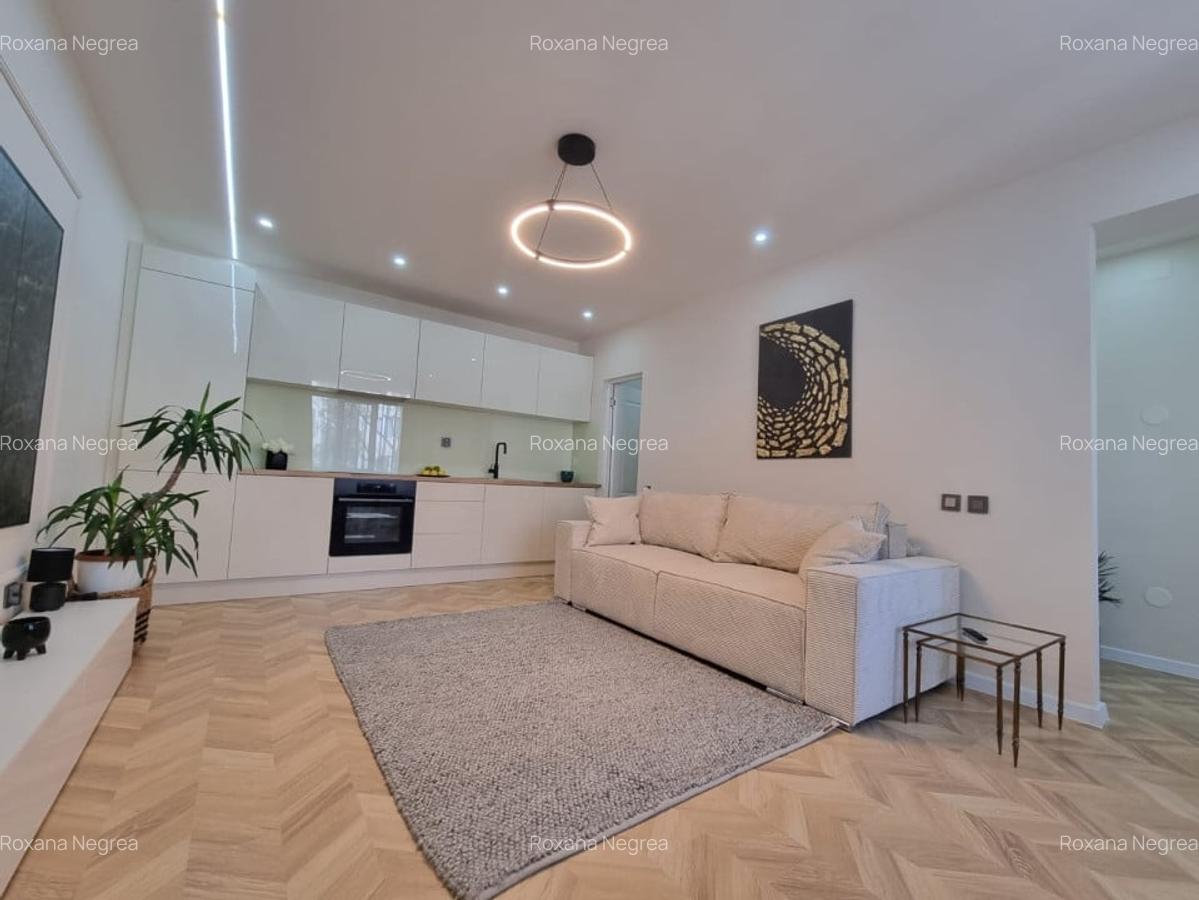 Apartament  cu 2 camere, ultrafinisat, zona semicentrala, etaj intermediar - 2