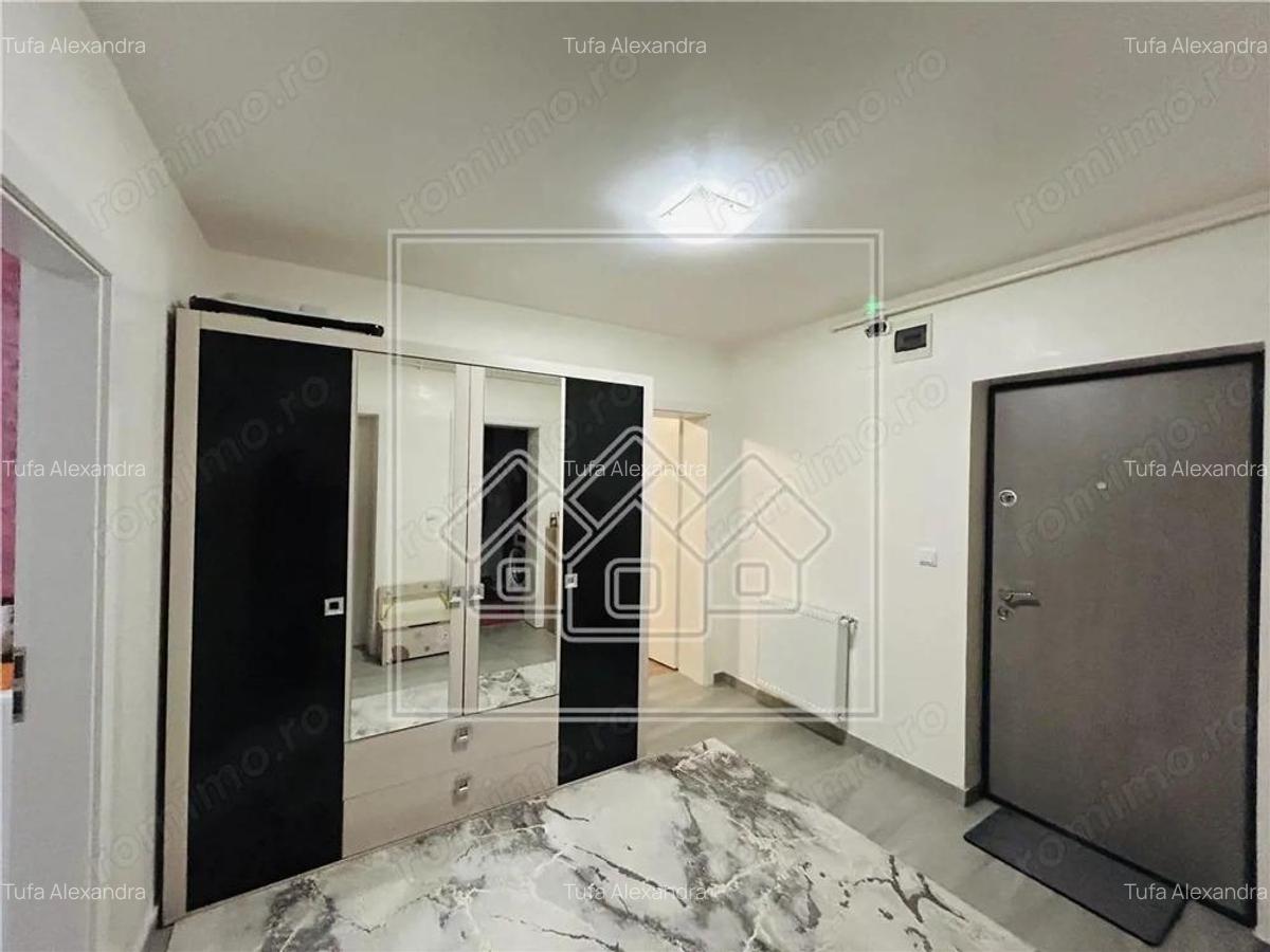 Ap cu 2 camere, balcon inchis, decomandat situat in Selimbar - 16