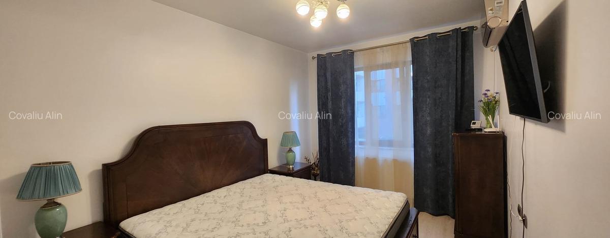Apartament 2 camere, 2 grupuri sanitare, loc parcare, situat in Tractorul - 21
