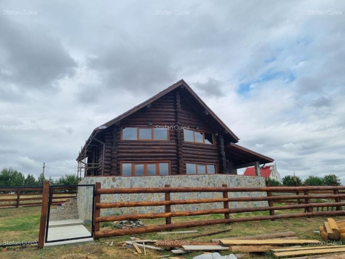 Casa modernizată în 2024 din bușteni de brad - 1 Casa modernizată în 2024 din bușteni de brad - 1