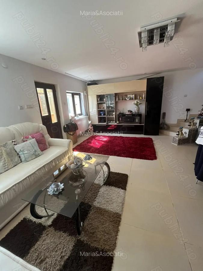 COMISION 0 Casa P+1 2 intrari 7 camere 4 bai teren total 861 mp Poroinica - 7