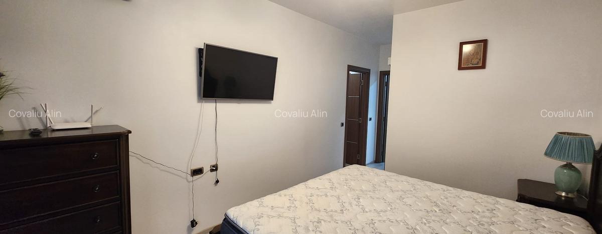 Apartament 2 camere, 2 grupuri sanitare, loc parcare, situat in Tractorul - 20