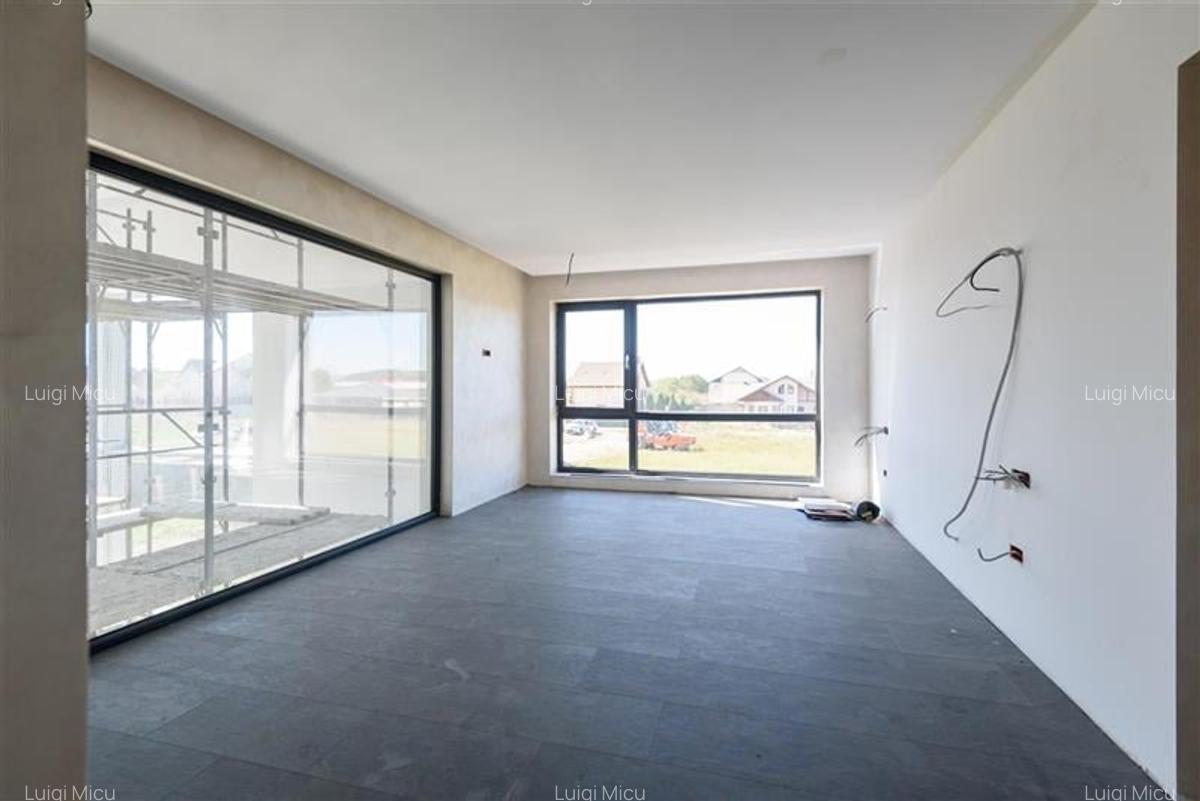 Casa noua in Harman, cu arhitectura moderna si spatii vitrate - 17