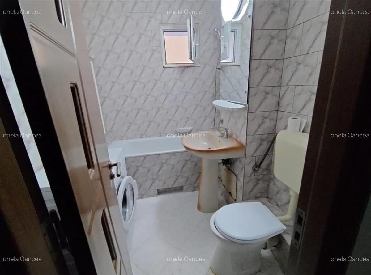 Apartament cu 3 camere situat in Tractorul - 10