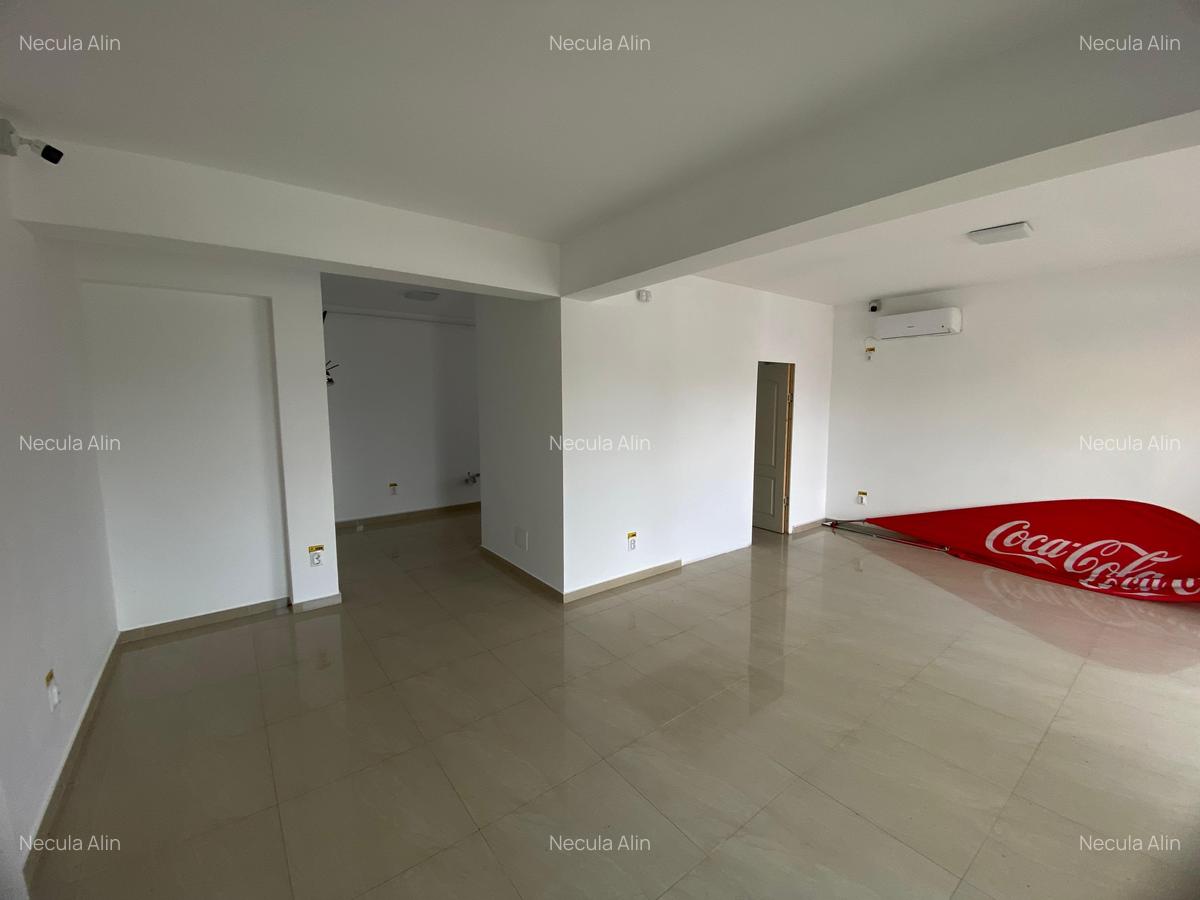 Spatiu comercial de inchiriat. Camere video. 3 locuri de parcare - 4