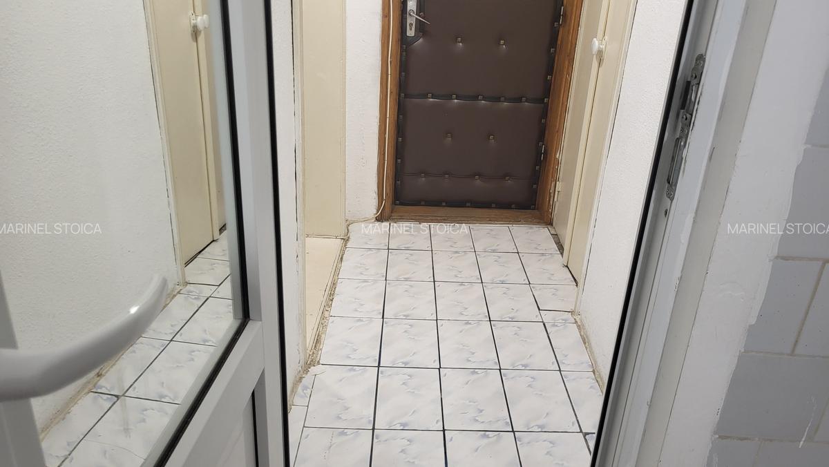 De inchiriat apartament 2 camere, situat etaj 1 in bloc mic, zona Hotel Vrancea. - 14