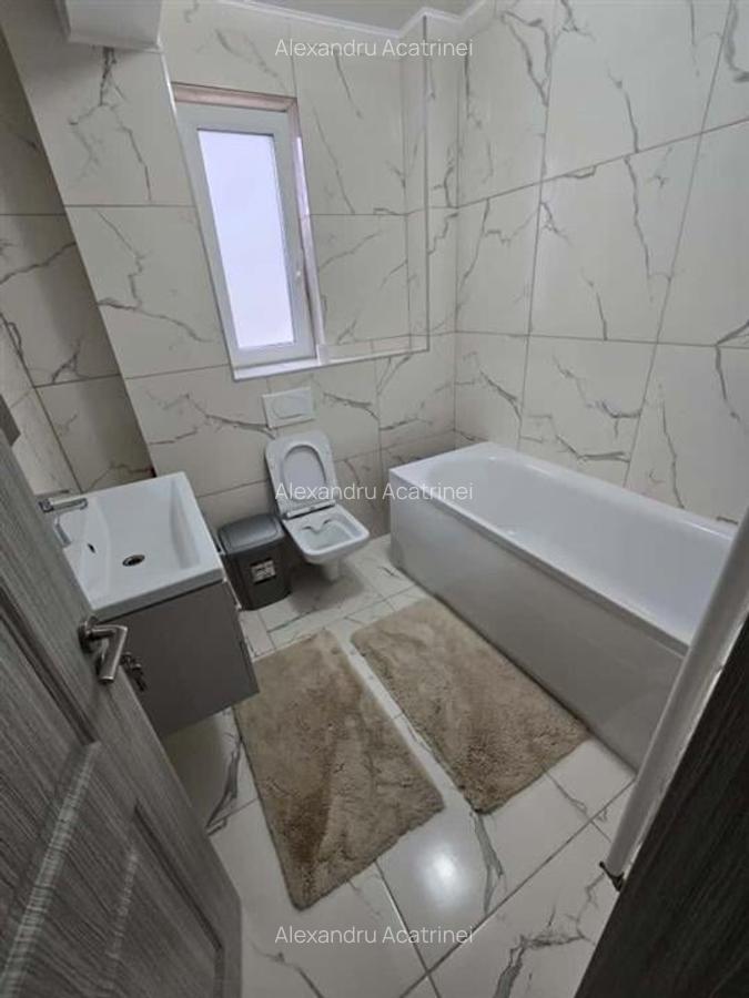 Apartament nou - 2 camere decomandat, geam la baie, loc de parcare inclus - 9