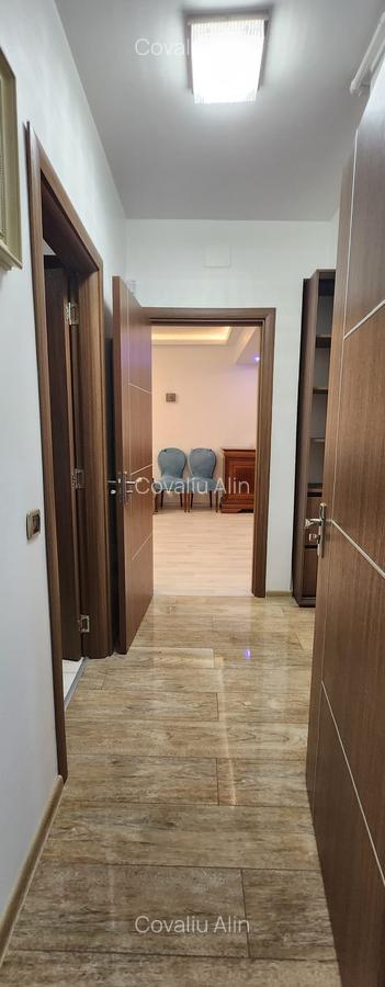 Apartament 2 camere, 2 grupuri sanitare, loc parcare, situat in Tractorul - 14