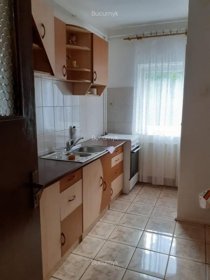 Inchiriez apartament 2 cam ,decomandat, situat in Racadau - 2