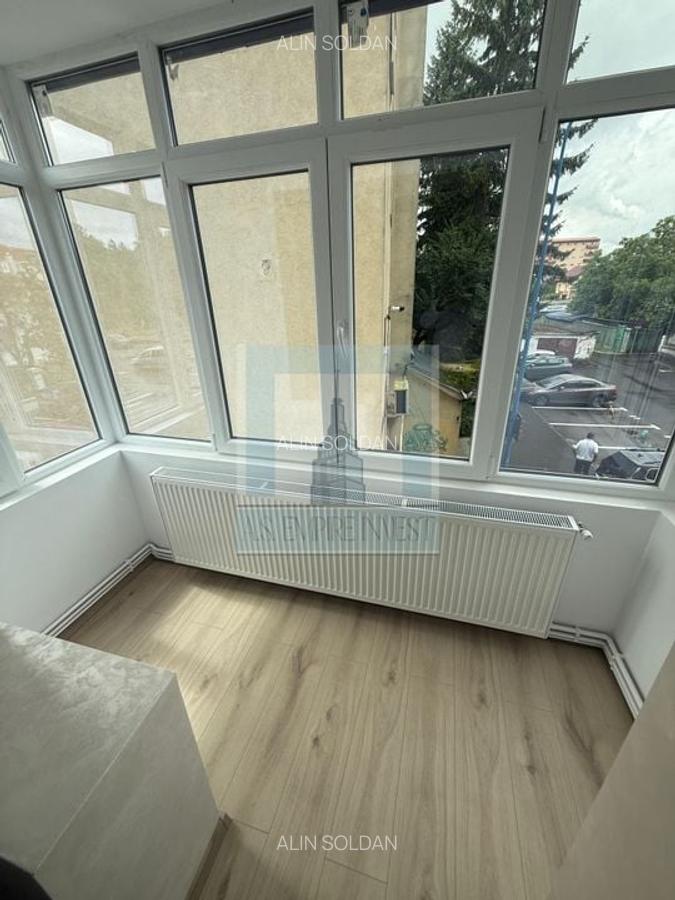Apartament 4 camere renovat complet, etj. 1/4 - zona Tractorul - 13