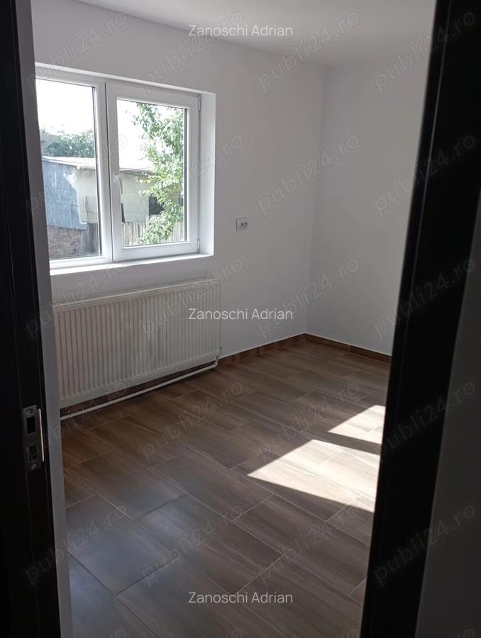 Casa de vanzare, cartier Tuguiata, renovata recent. - 4