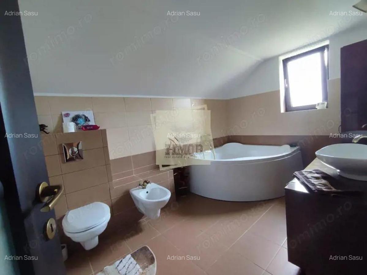 Casa cu 4 camere 3 bai garaj inchis si teren 1100 mp in Tocile - 2