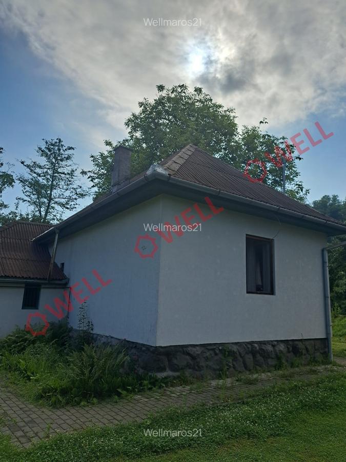 De vânzare în centrul Sovata un teren de 2159 m² cu mai multe case în aceeași cu - 12