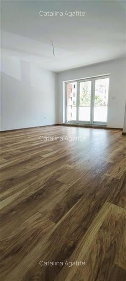 Apartament cu 3 camere decomandat în Tractorul - 12