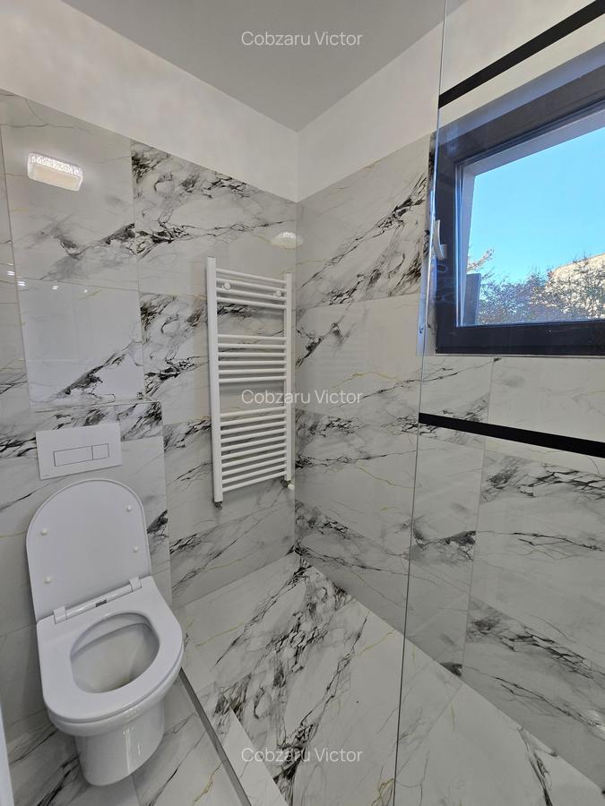 APARTAMENT DE VÂNZARE CU DOUĂ CAMERE DE 80 MP ZONA ȘOSEAUA CHITILEI SEC.1 - 10