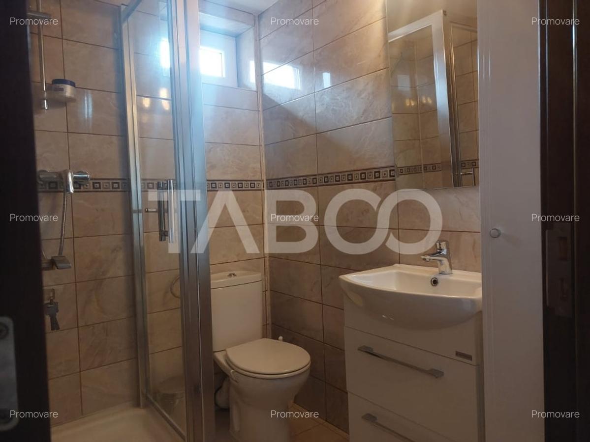 Apartament la casa 97 mpu 5 camere 2 bucatarii 3 bai gradina Cisnadie - 10