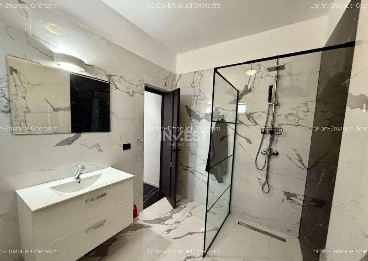 Vila de vanzare cu design deosebit in cartierul Bucium - 10