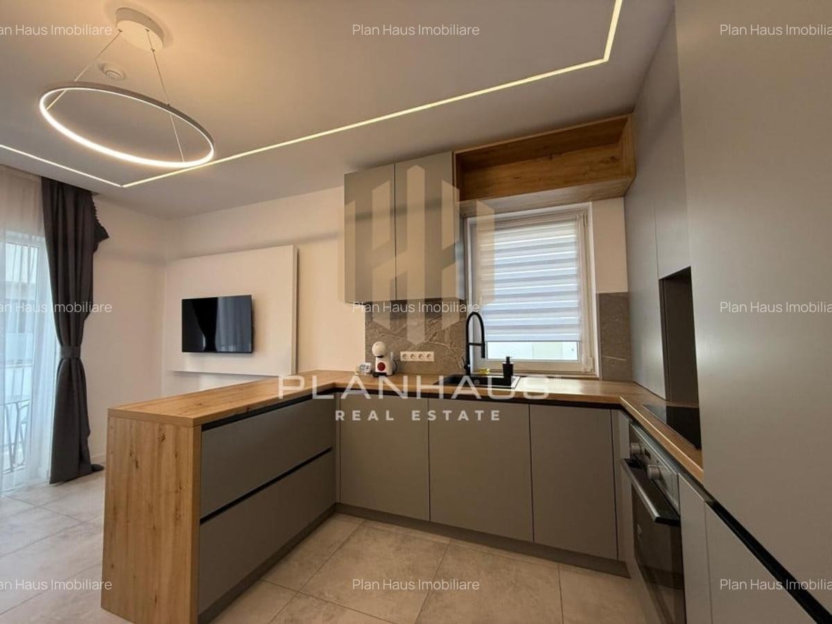 Inchiriere-ultramodern apartament zona rezidentiala ,3 camere,etaj 1,loc de parc - 9