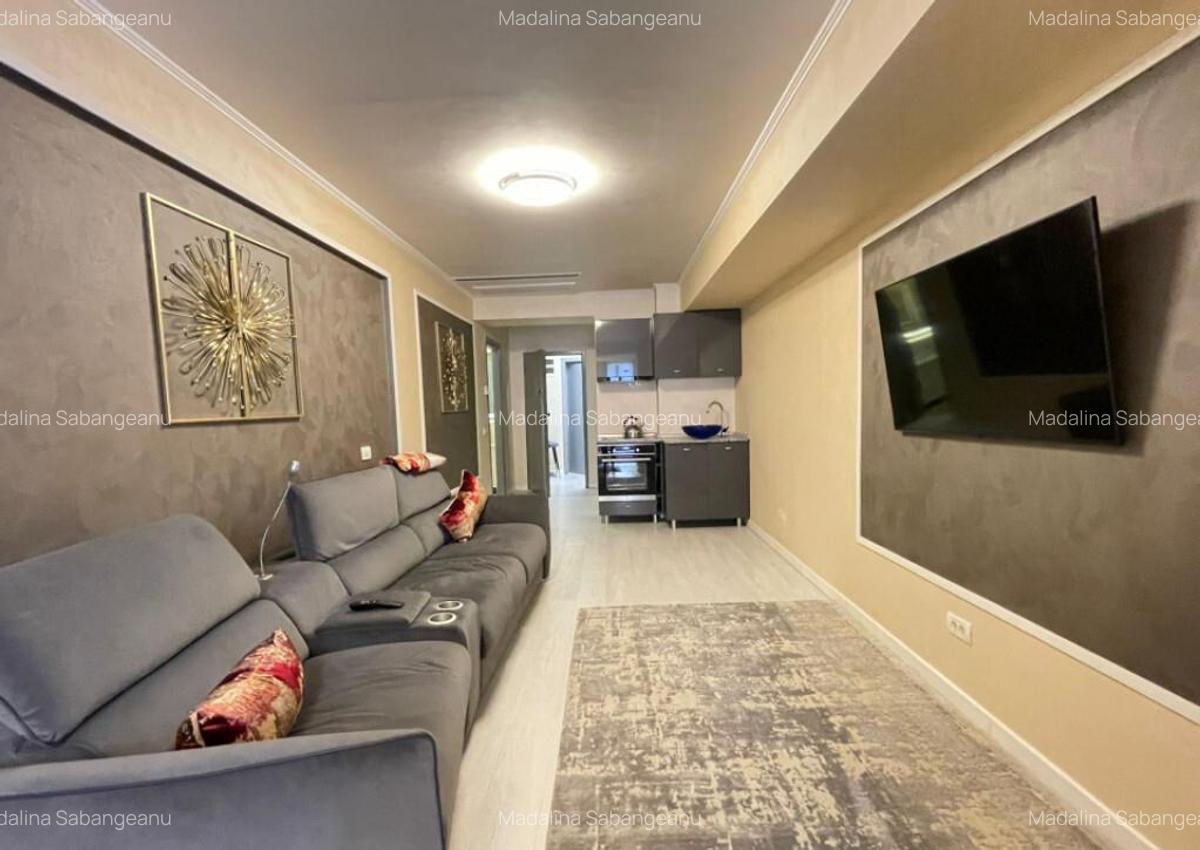 Apartament de 3 camere ?i curte privata - Parcare subteran - 3