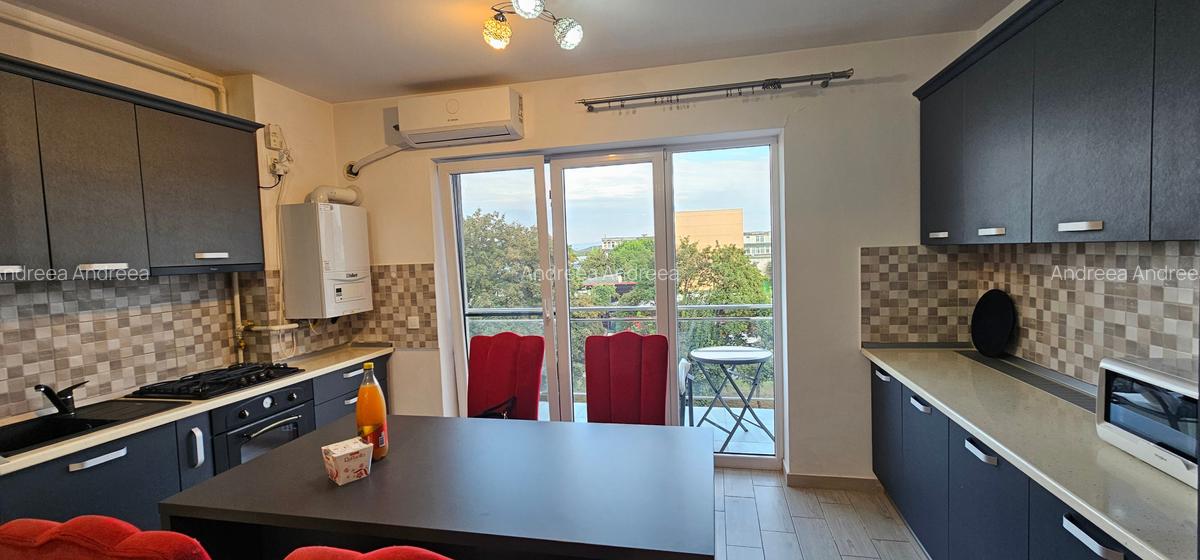 Apartament cu 3 camere de inchiriat zona Tractorul bloc nou - 11