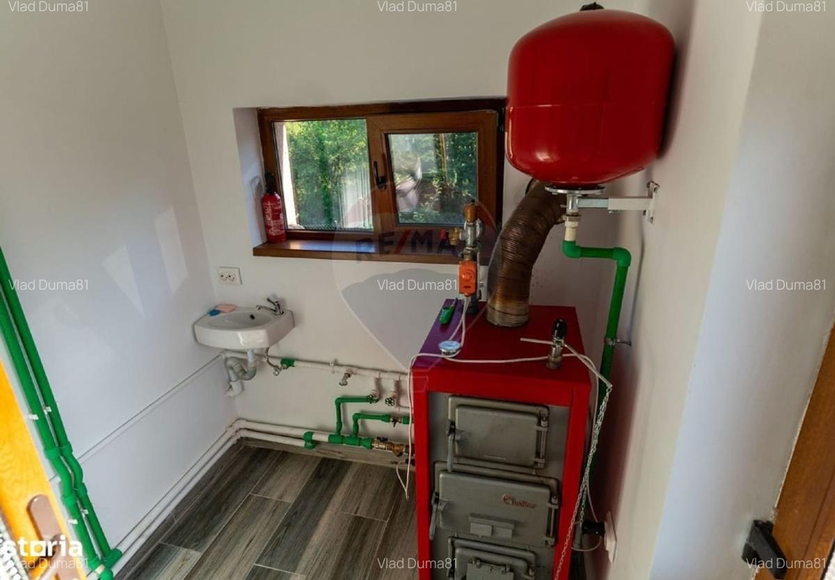 Casa cu teren generos modernizata și complet utilata în Vălișoara - 8