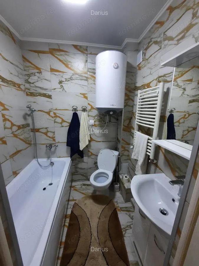 Se ofera spre inchiriere garsoniera in zona Titan - 3
