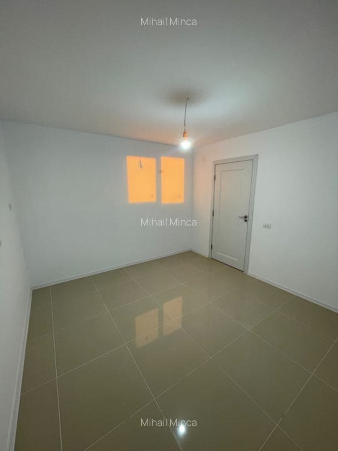 APARTAMENT CU GRĂDINĂ & LOC DE PARCARE –  54 mp - 16