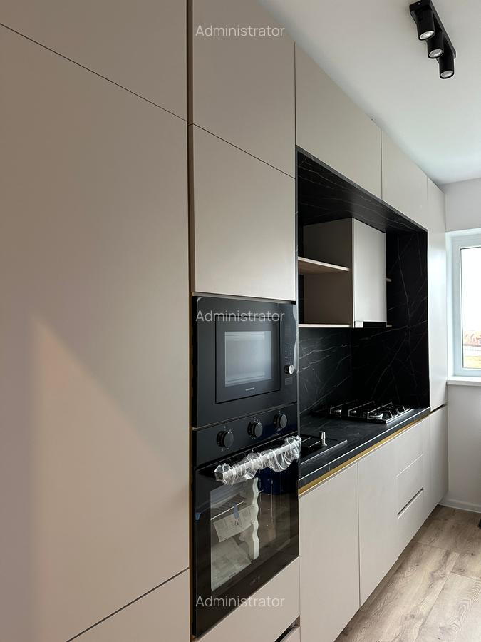 Apartament modern cu 3 camere, doua bai, etaj 4/6 (cu lift), prima inchiriere - 11