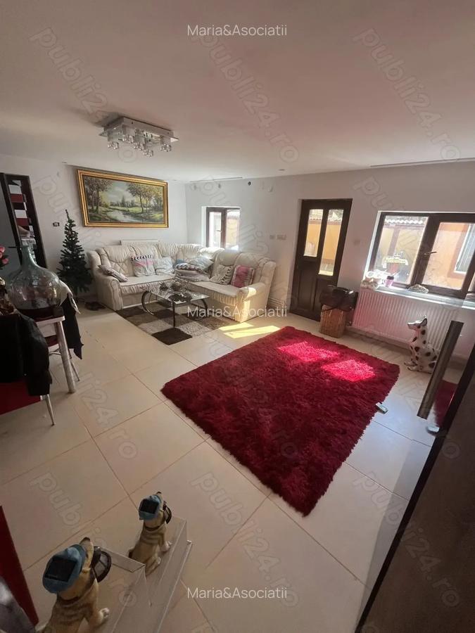 COMISION 0 Casa P+1 2 intrari 7 camere 4 bai teren total 861 mp Poroinica - 6