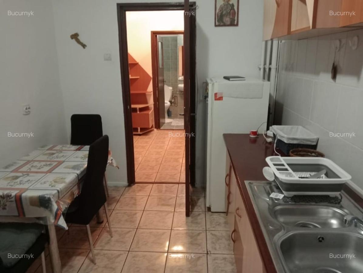 Inchiriez apartament 2 cam ,decomandat, situat in Racadau - 5