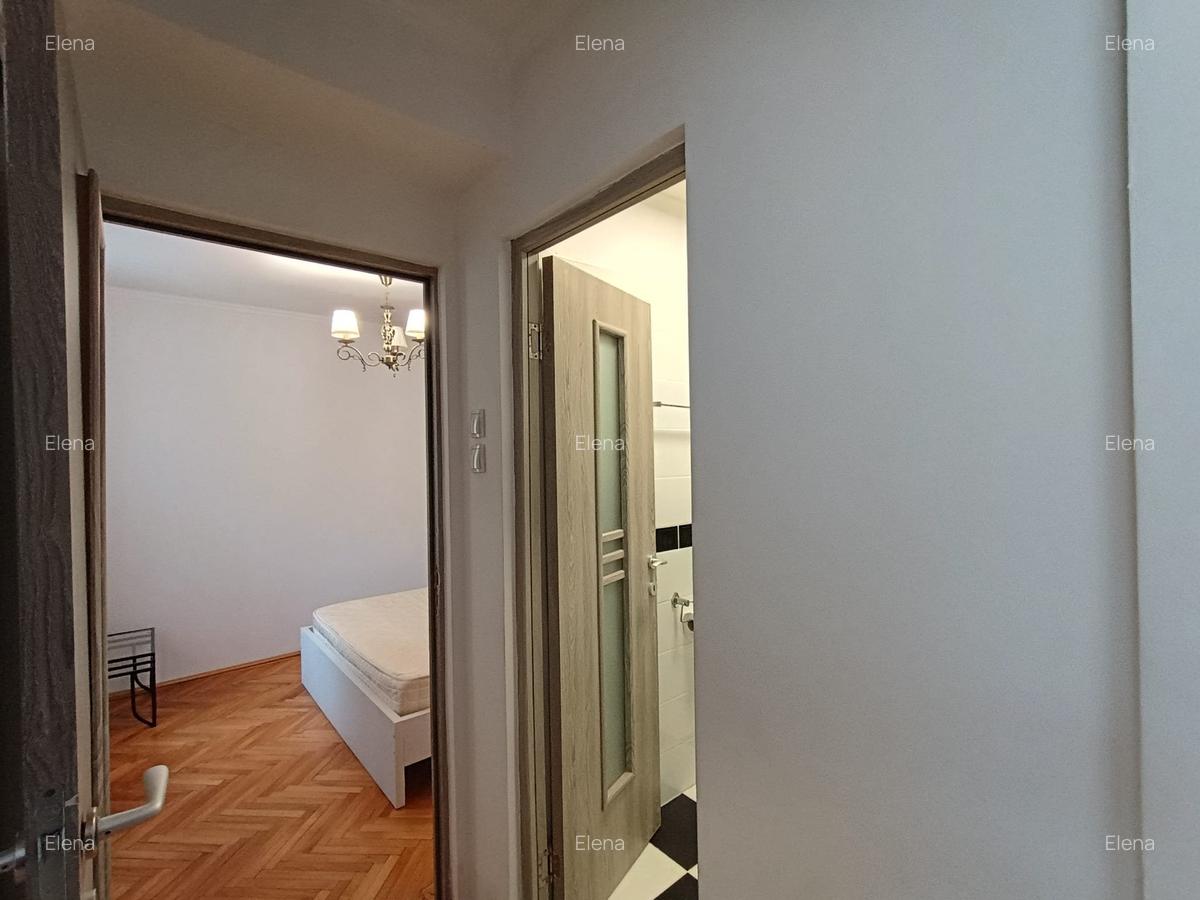 Magheru 2 camere renovat complet si mobilat - 9