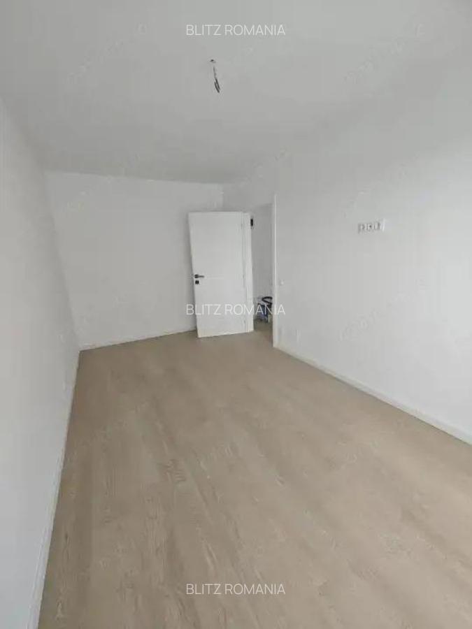 Apartament 3 camere - bloc nou - etaj 1 - cu parcare si balcon generos - modern - 4