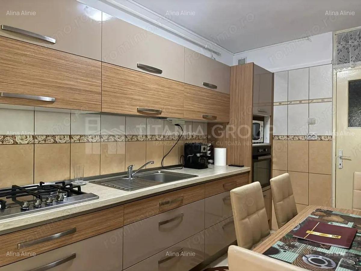 Apartament cu 2 camere, 2 bai, decomandat - zona Racadau - 4